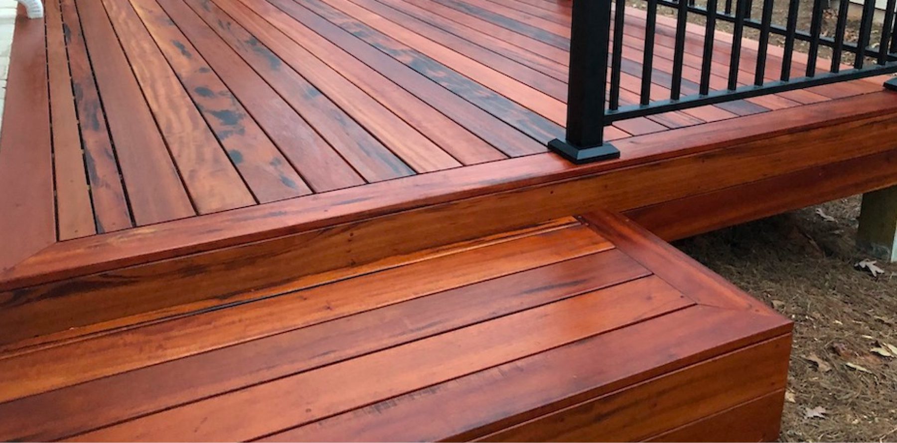 Wood deck with metal rail
