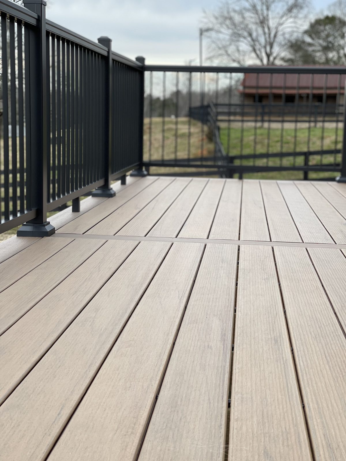 Perspective view of the composite deck with black railing